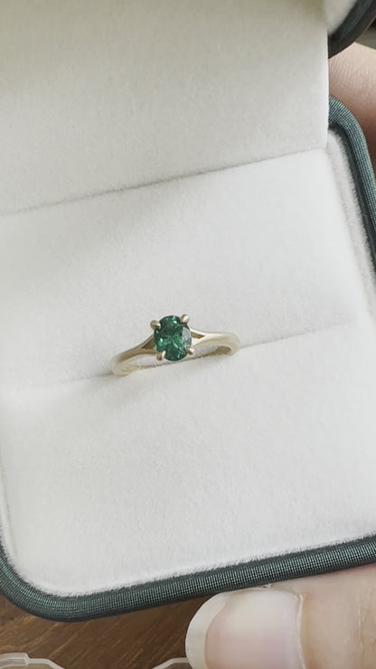 Emerald oval cut engagement ring