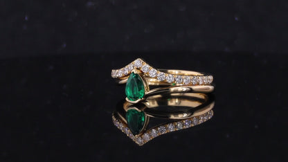 Emerald pear cut engagement ring